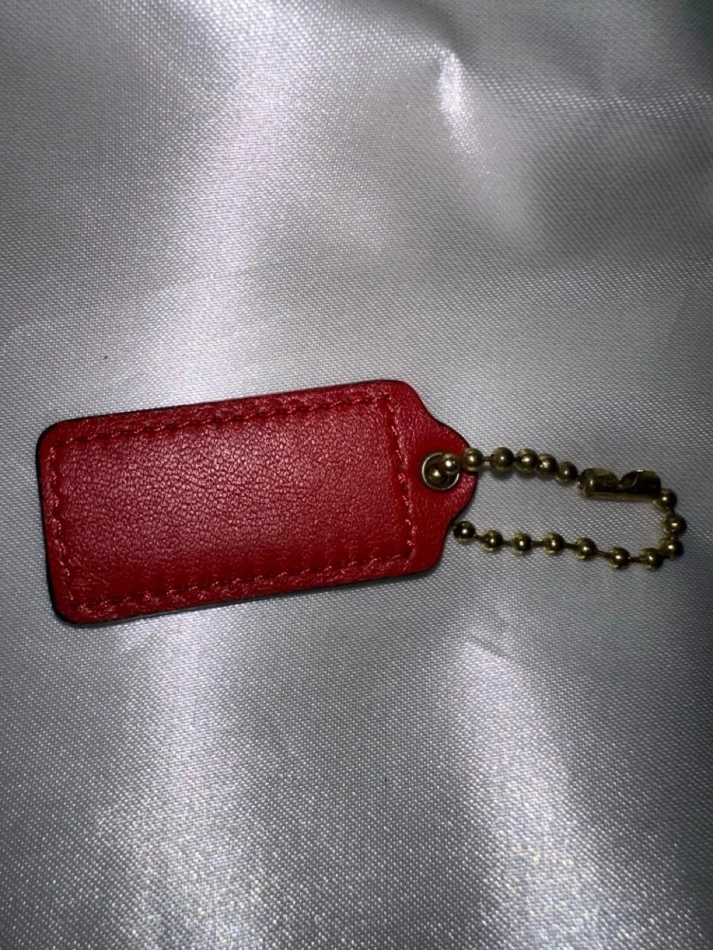 COACH Red Leather Hang Tag with Gold Chain